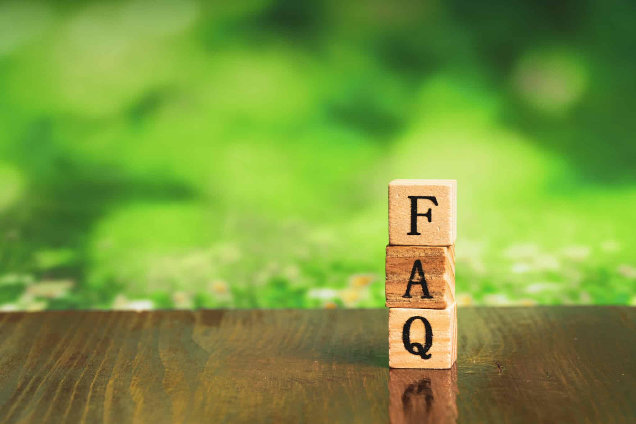 Sewer Cleanout Location Marking for Safe and Fast Access 2 Wooden cubes spelling FAQ for sewer cleanout location frequently asked questions.