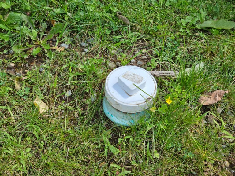 Sewer cleanout location marking for safe and fast access.