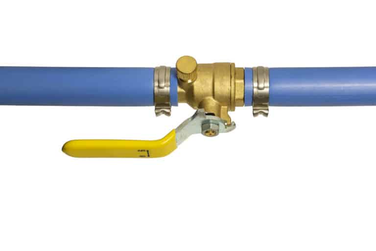 Fixture shutoff valves on the blue PEX pipe.