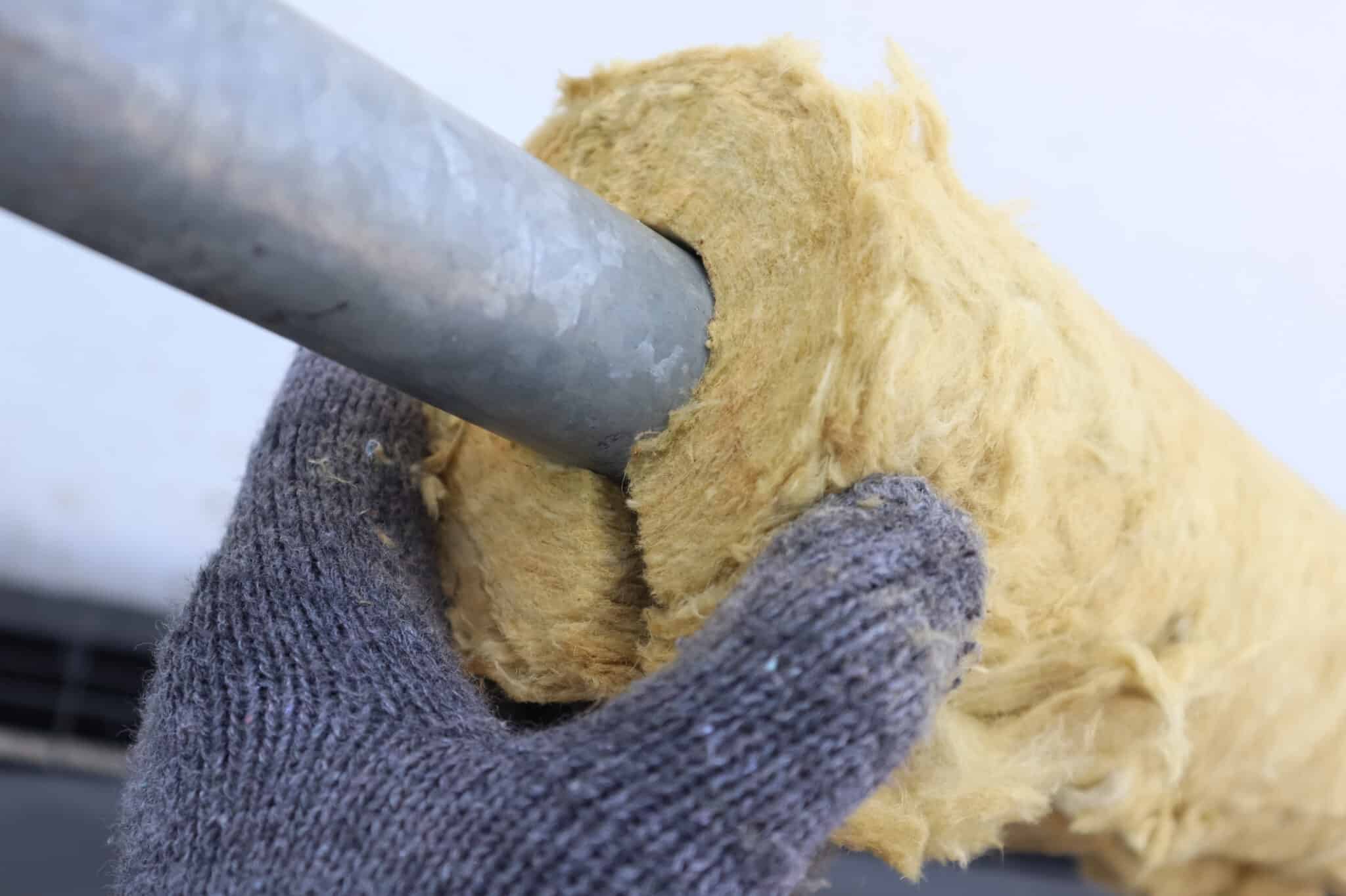 Pipe insulation upgrades using fiberglass insulation to reduce heat loss.