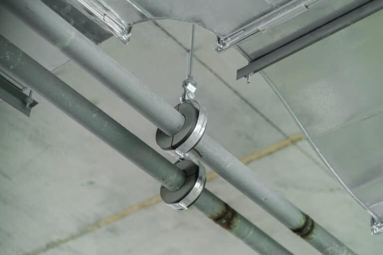 Pipe hanger spacing that prevents noisy vibration.